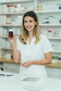 portrait of a beautiful female pharmacist working in a pharmacy 1.jpg